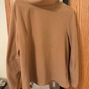 Dudley Stephen’s camel Greenpoint turtleneck.